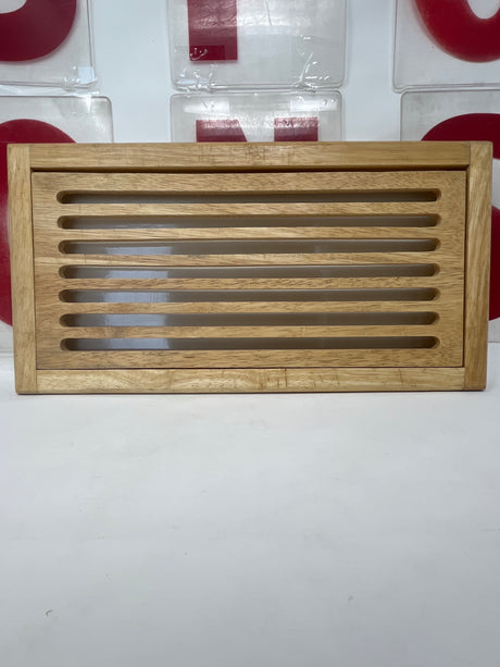 Bamboo Bread Board featuring a vented wooden design, perfect for slicing bread. Durable bamboo surface with a cleanable plastic base ensures freshness and easy maintenance.