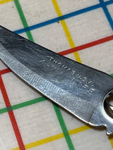 4-way knife and vegetable peeler - stainless steel and black plastic - vintage Thomas USA