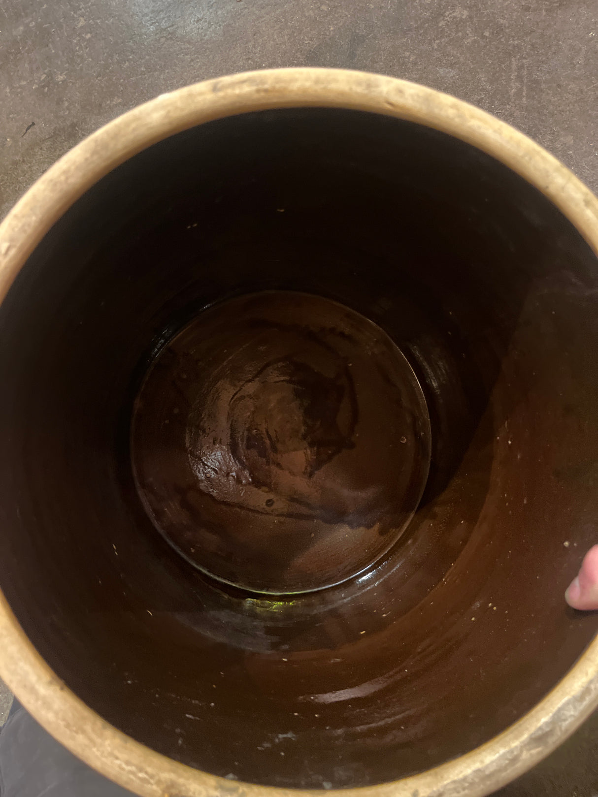 Antique 5 gallon stoneware ceramic pickling crock with a blue 5 stamp. Features tiny pock-marks inside, but in otherwise excellent condition.