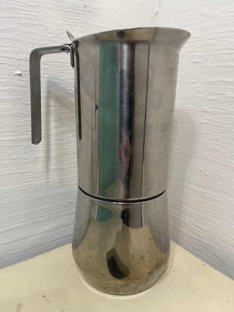 Ilsa Turbo Express 6-Cup 18/10 stainless steel stovetop espresso pot, featuring a two-piece design with minor base tarnishing, ideal for brewing rich espresso.