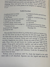 Leone’s Italian Cookbook (1967 First Edition) open to a “Stuffed Zucchini” recipe with detailed ingredients and step-by-step cooking instructions.