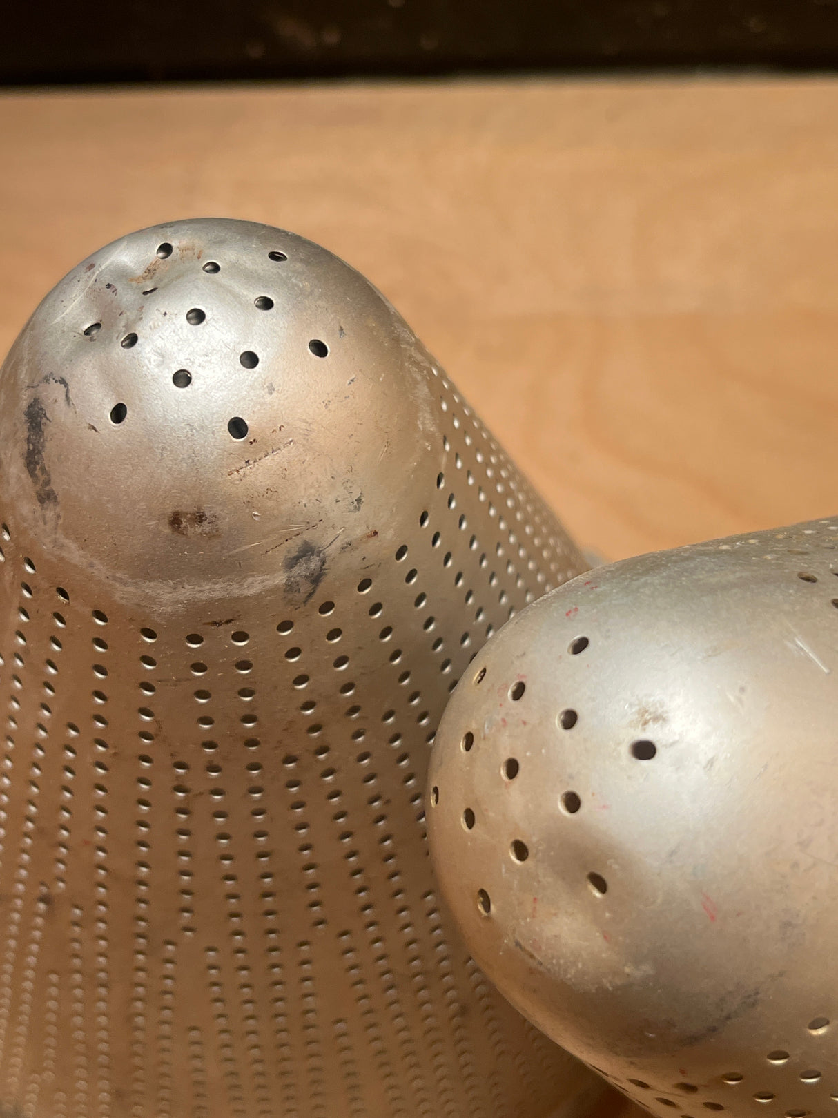 Cone sieve strainer DENTED - aluminum, features a perforated metal design for efficient tea straining. Note: Minor dents on cone tip, functionality unaffected.