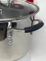 Calphalon 8608 8 qt. stock pot with lid featuring silicone handles, shown in a detailed close-up highlighting its sturdy construction and kitchenware design.