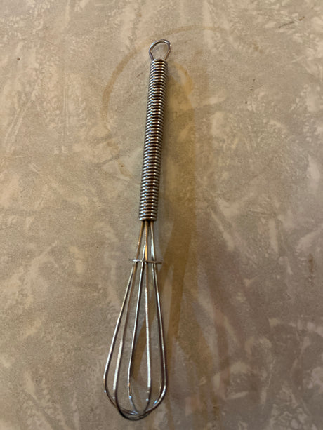 Mini whisk - stainless steel 4.5, ideal for mixing small portions. Features a spring-wrapped handle and classic wire-loop design for beating eggs or stirring sauces.