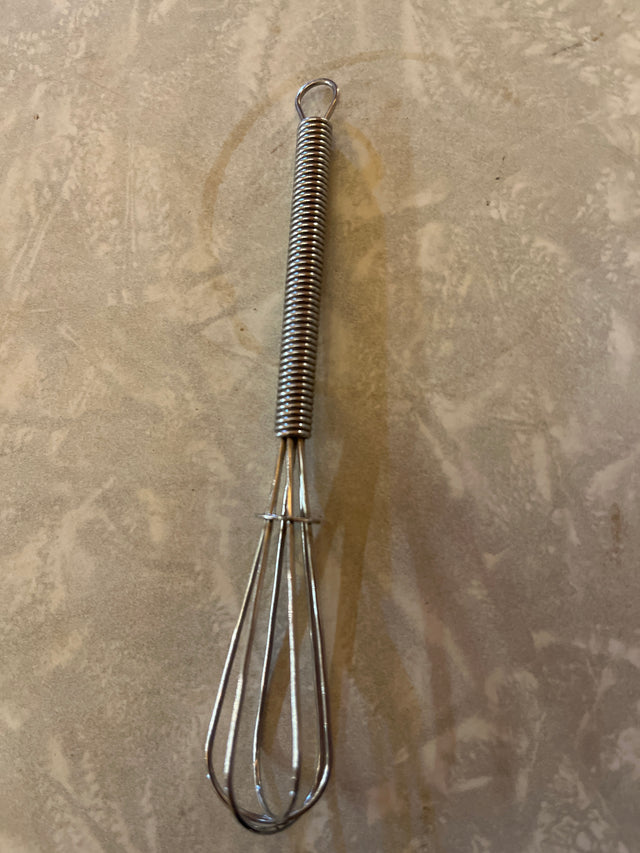 Mini whisk - stainless steel 4.5, ideal for mixing small portions. Features a spring-wrapped handle and classic wire-loop design for beating eggs or stirring sauces.