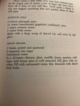 Trader Vic’s Bartender’s Guide (Revised 1972) book page showing Acapulco Gold and Lemon Squash drink recipes, highlighting its utility for mixologists.