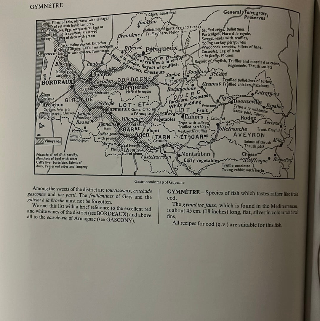 The World Authority The New Larousse Gastronomique book page showing a detailed map alongside culinary information, reflecting its comprehensive and encyclopedic nature.