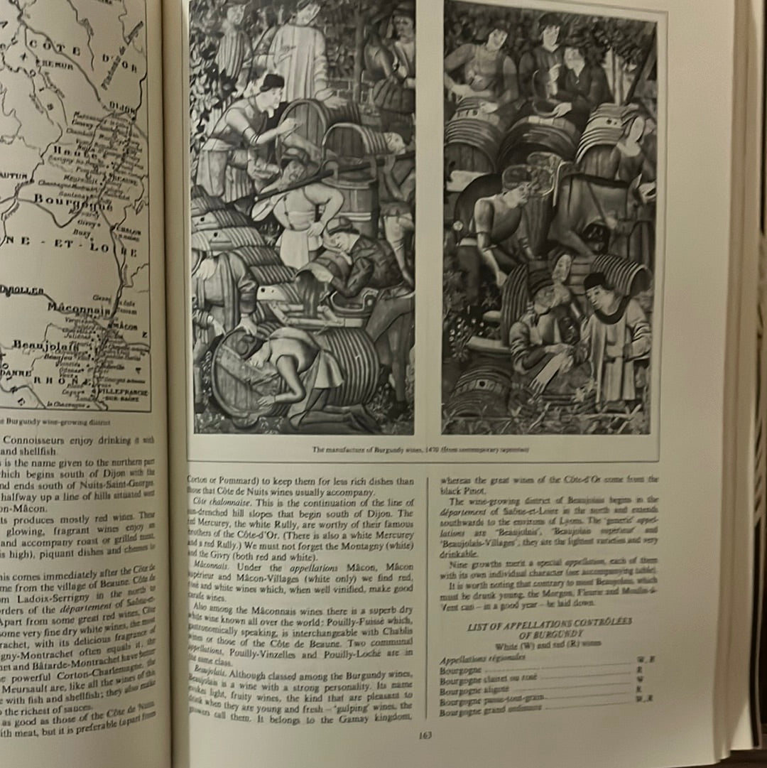 The World Authority The New Larousse Gastronomique: Open book showing historic illustrations, maps, and encyclopedic culinary content from its comprehensive 1,072 pages.