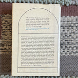 The Art of Good Cooking book on a rug, showcasing its cover. Features diverse, innovative recipes by Paula Peck, emphasizing simplicity and international flavors.