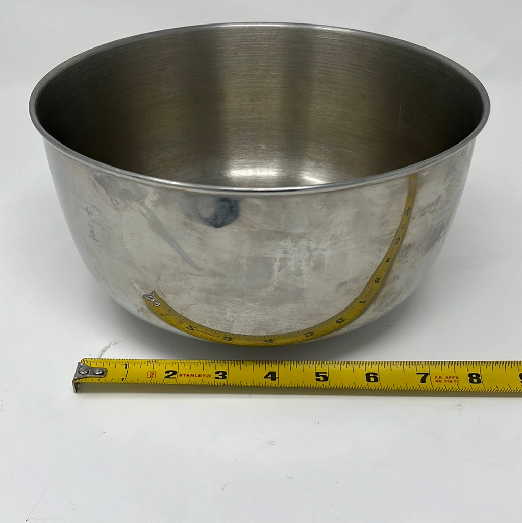 Unbranded Stainless Steel Mixing Bowl with measuring tape, yellow tape measure, and silver pot.