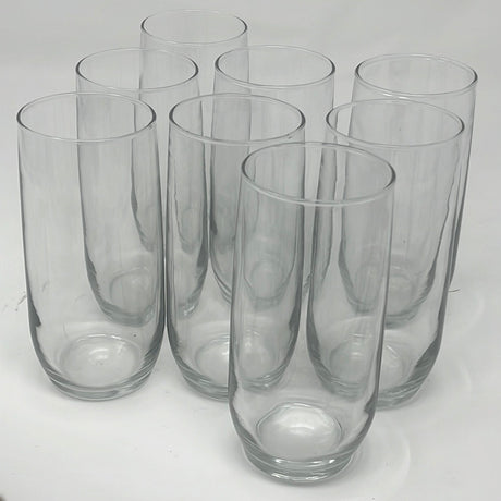 Tall glass tumblers - set of 8, a group of empty glasses and a clear glass vase, perfect for everyday use.