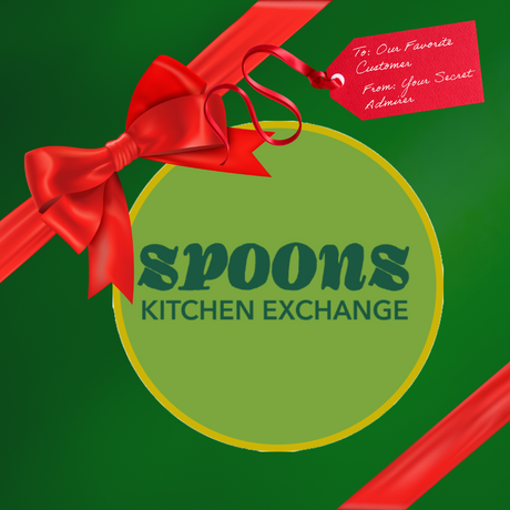 Gift Card - Spoons Kitchen Exchange: A green gift box with a red ribbon and bow, featuring a tag, perfect for versatile gifting this holiday season.