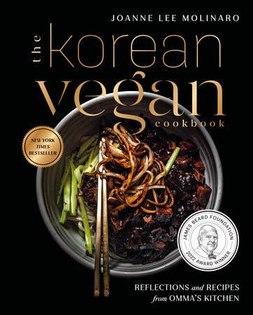 Cover of The Korean Vegan Cookbook by Joanne Lee Molinaro featuring noodles with vegetables, chopsticks, and bestseller badges, highlighting vegan Korean recipes and family stories.