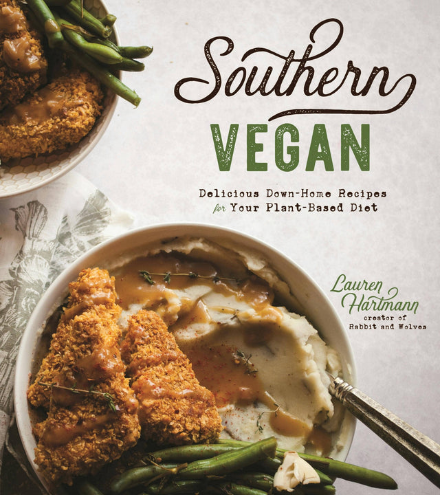 Cover of Southern Vegan: Down-Home Plant-Based Recipes by Lauren Hartmann features a bowl of vegan Southern comfort food: crispy plant-based cutlets, mashed potatoes with gravy, and green beans.