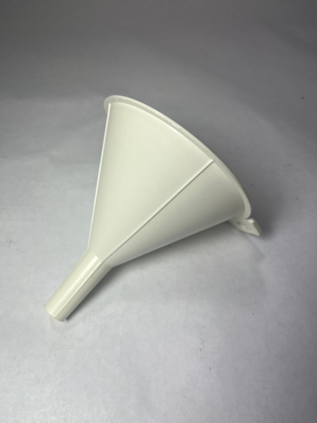 White plastic funnel on a surface, a handy tool for pouring liquids accurately. From Spoons Kitchen Exchange. 