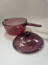 Cranberry Vision Ware pot with lid, close-ups of glass pot, bowl, and lid on white surface.