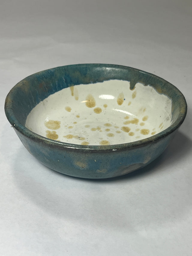 Handmade ceramic bowl with blue glaze, signed by Judy Longt, could be used as a planter holder.